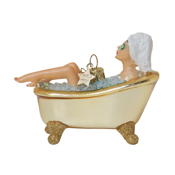 Woman in shiny gold bath
